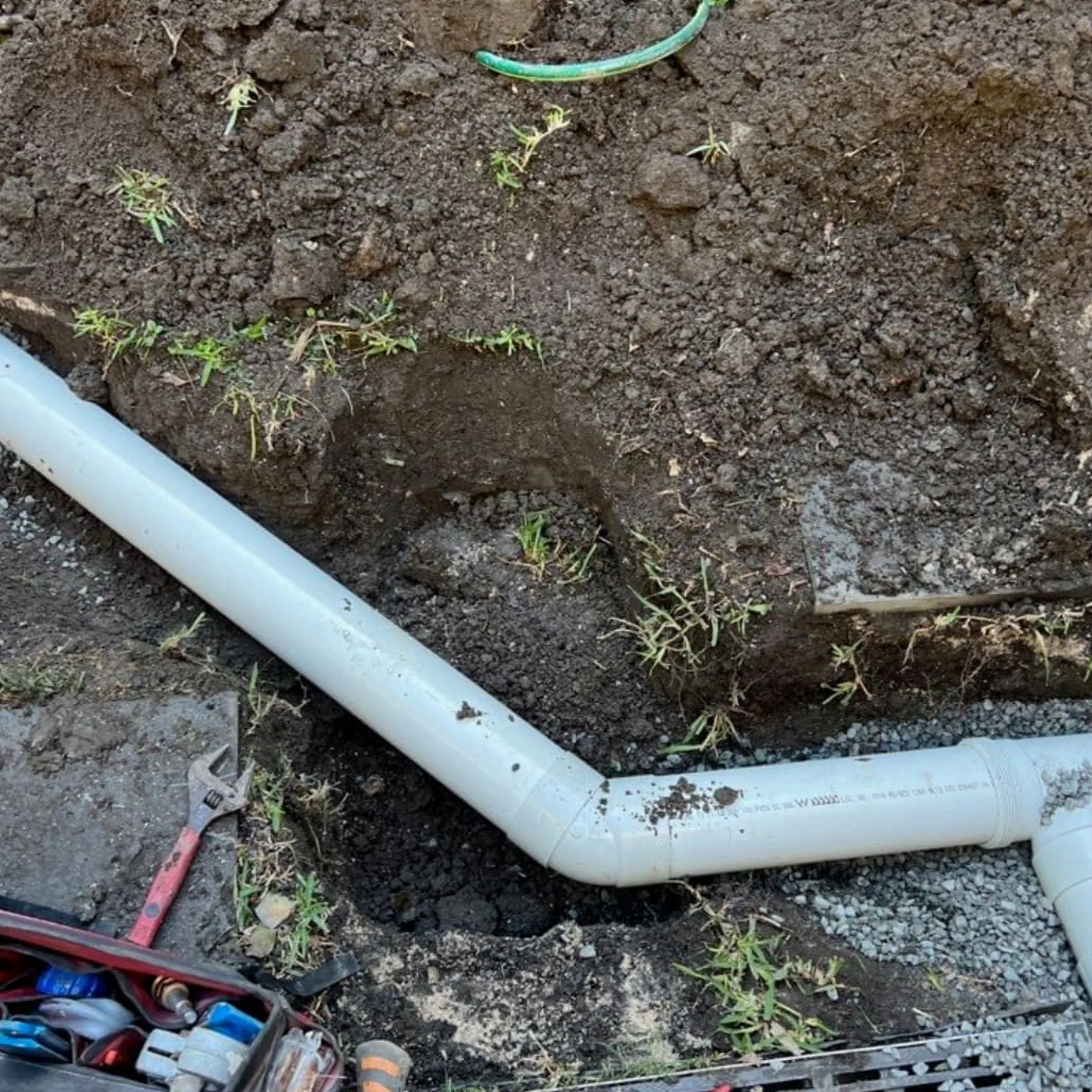 exposed stormwater pipes and maintenance tools