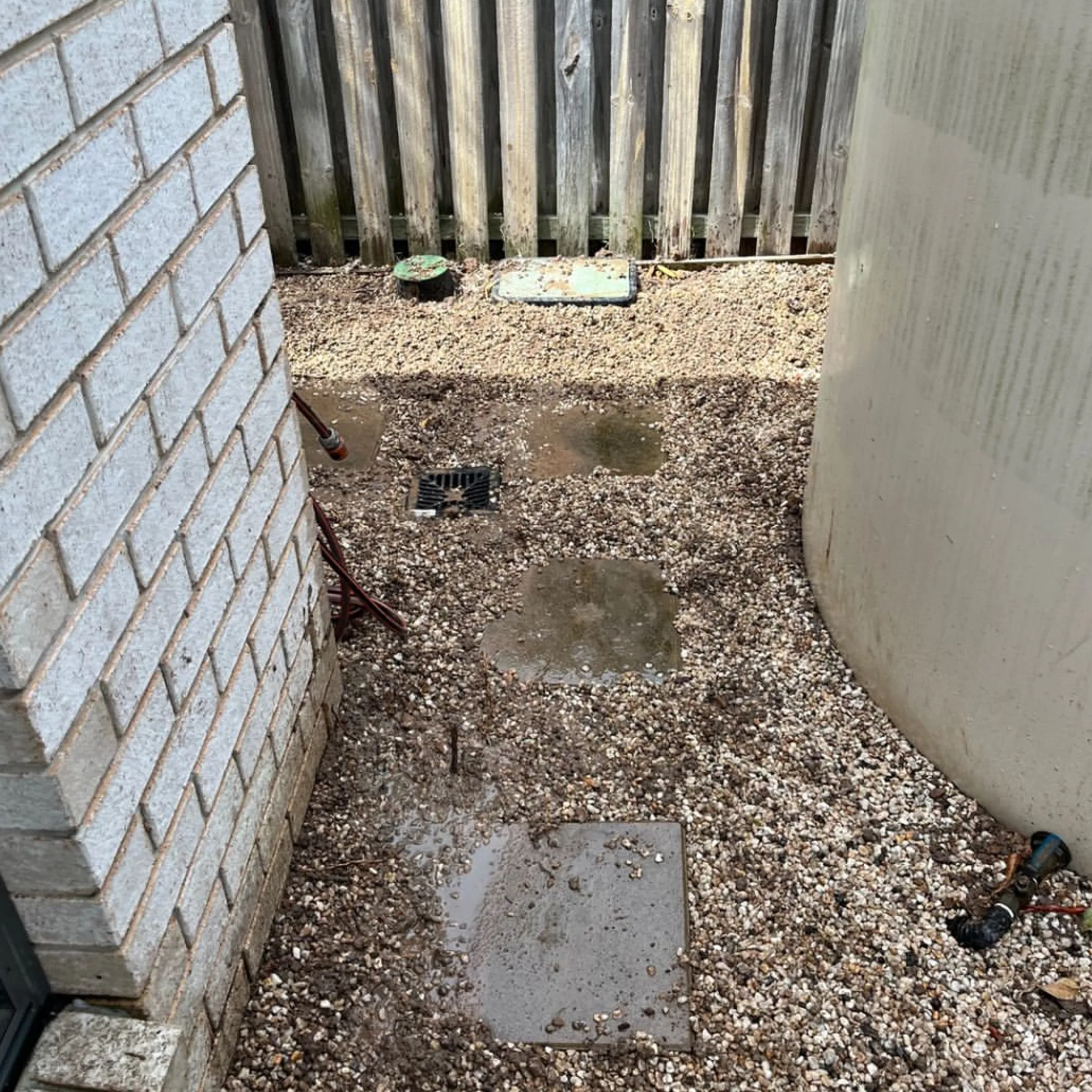 standing water, grates and gravel