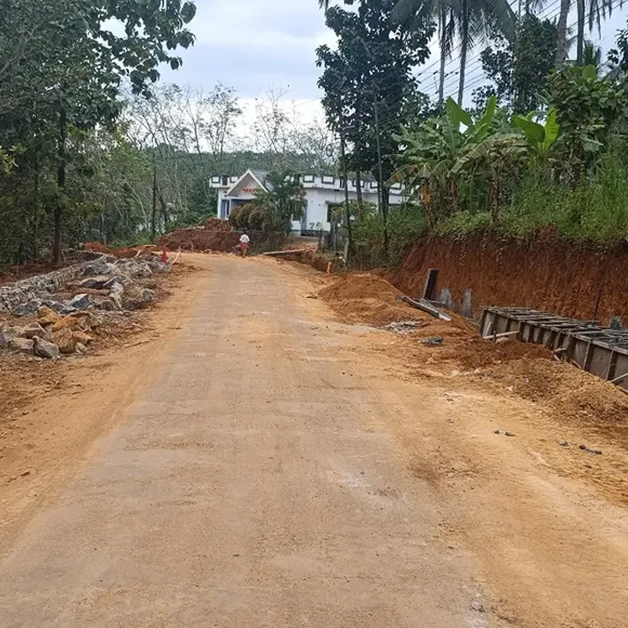 unmarked road with drainage works